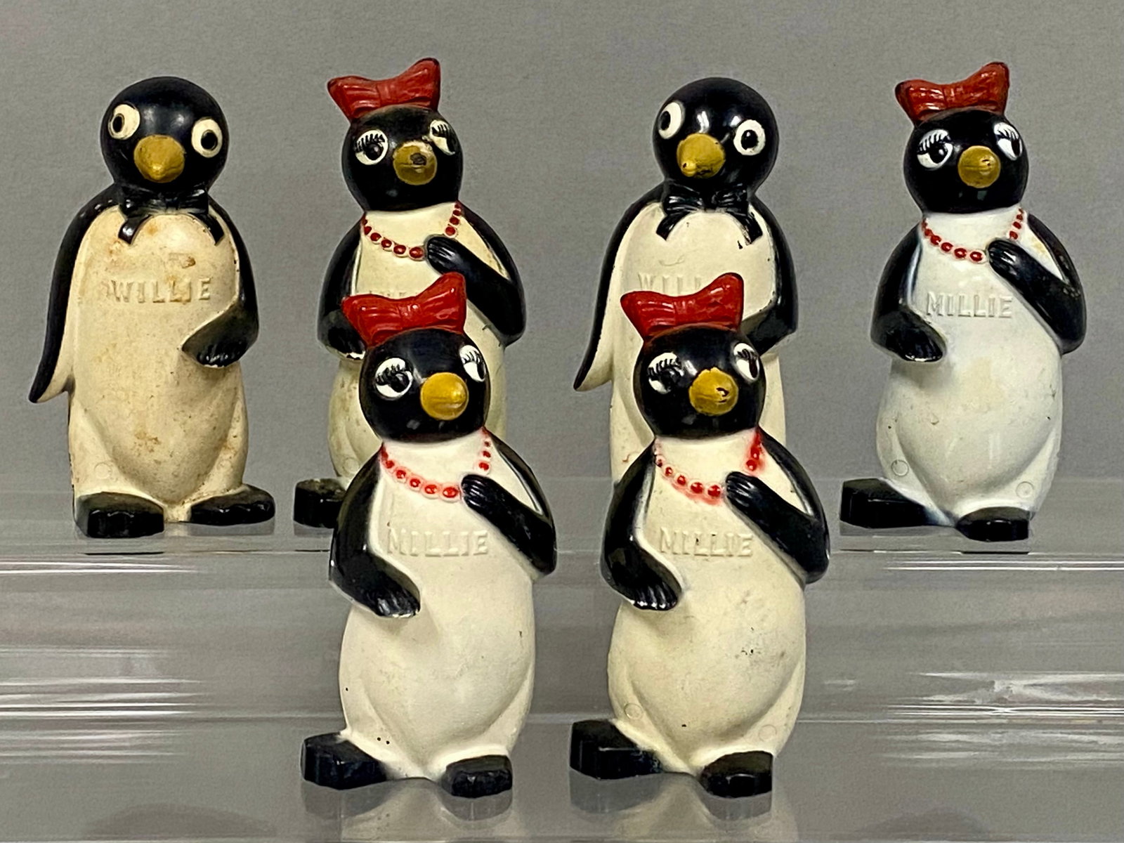 6 F & F Plastic Kool Penguin Shakers: A collection of six vintage molded plastic salt and pepper shakers produced by F & F Mold & Die Works as advertising premiums for Kool cigarettes. The group consists of two Willie penguins and four Mi