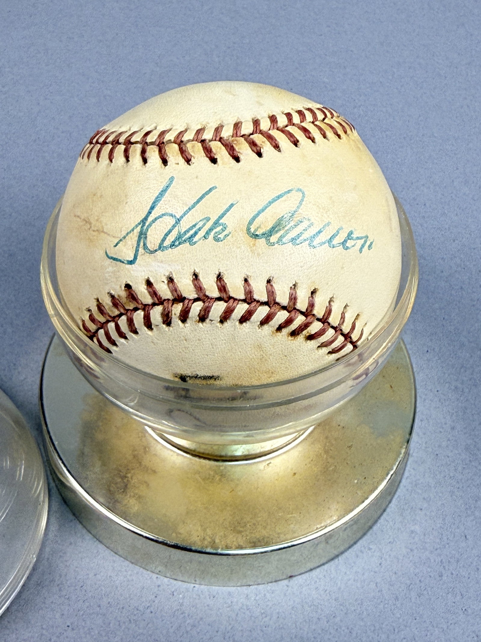 Hank Aaron Signed Official National League Baseball: This Official National League baseball features the hand-signed autograph of Baseball Hall of Fame member Hank Aaron. The signature is applied in blue ink across the sweet spot of the ball. A second s
