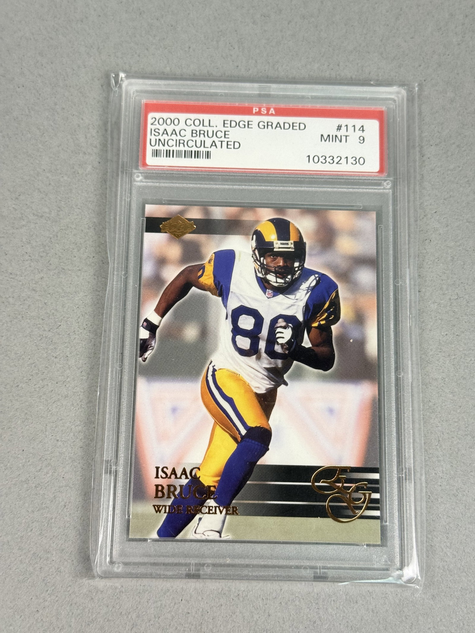 Collector's Edge Isaac Bruce PSA Graded Card: A 2000 Collector's Edge Graded football trading card featuring St. Louis Rams wide receiver Isaac Bruce. This uncirculated card is number 114 in the series and is professionally authenticated and grad