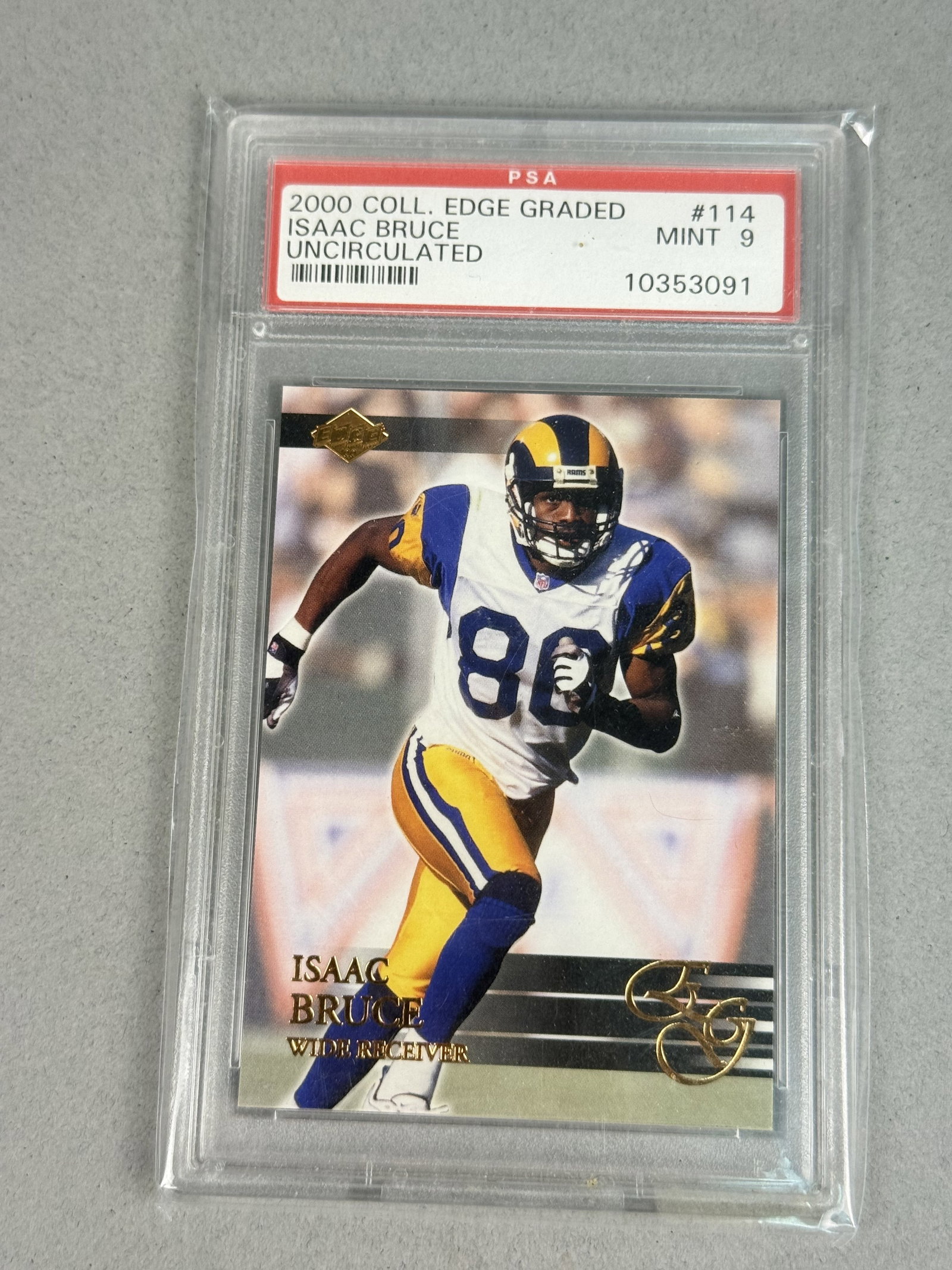Collector's Edge Isaac Bruce PSA 9 Mint 10353091: A 2000 Collector's Edge Graded football trading card featuring Hall of Fame wide receiver Isaac Bruce of the St. Louis Rams. Identified as card number 114, this piece bears an Uncirculated designation