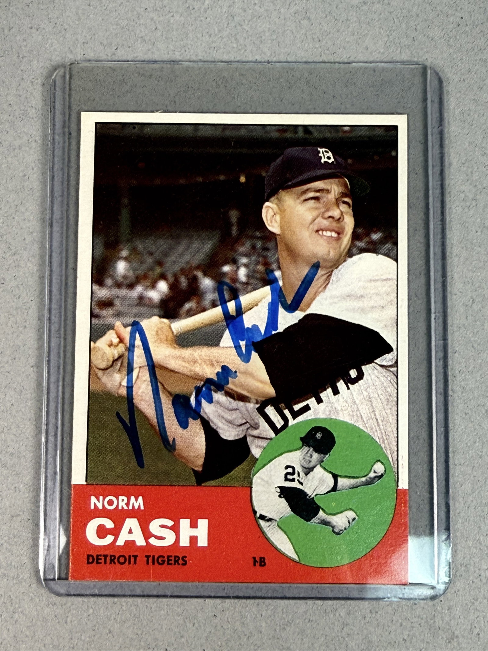 1963 Topps Norm Cash Signed Baseball Card: A vintage 1963 Topps baseball card, number 445, featuring first baseman Norm Cash of the Detroit Tigers. The card front displays the characteristic dual-photo design of the 1963 set, consisting of a p