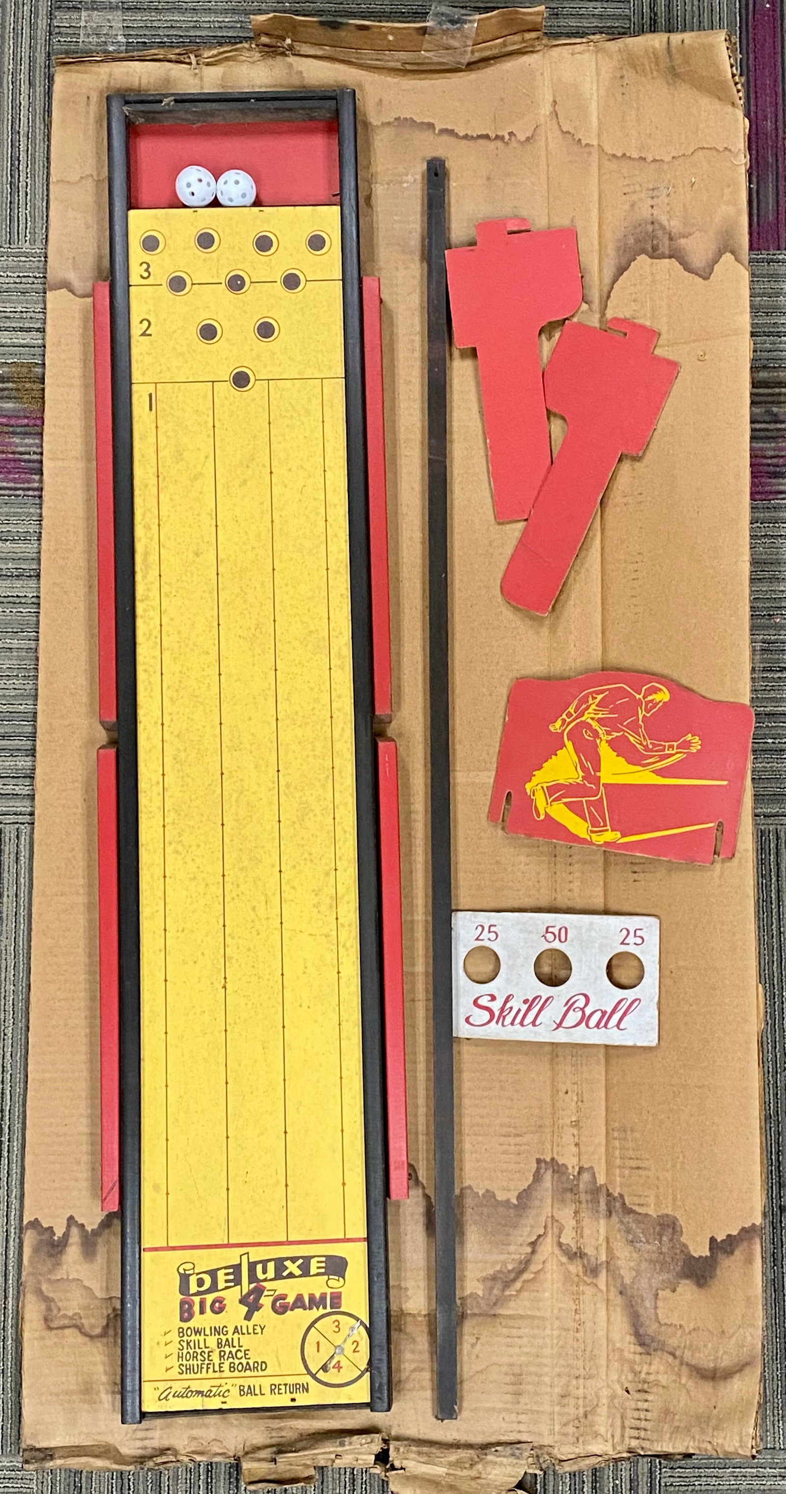 De Luxe Game Corp Big 4 Game Set: A vintage floor-model multi-game set manufactured by the De Luxe Game Corp. of Kingston, Pennsylvania. This model, identified on the original box as -1975N Bowling Alley, features a long