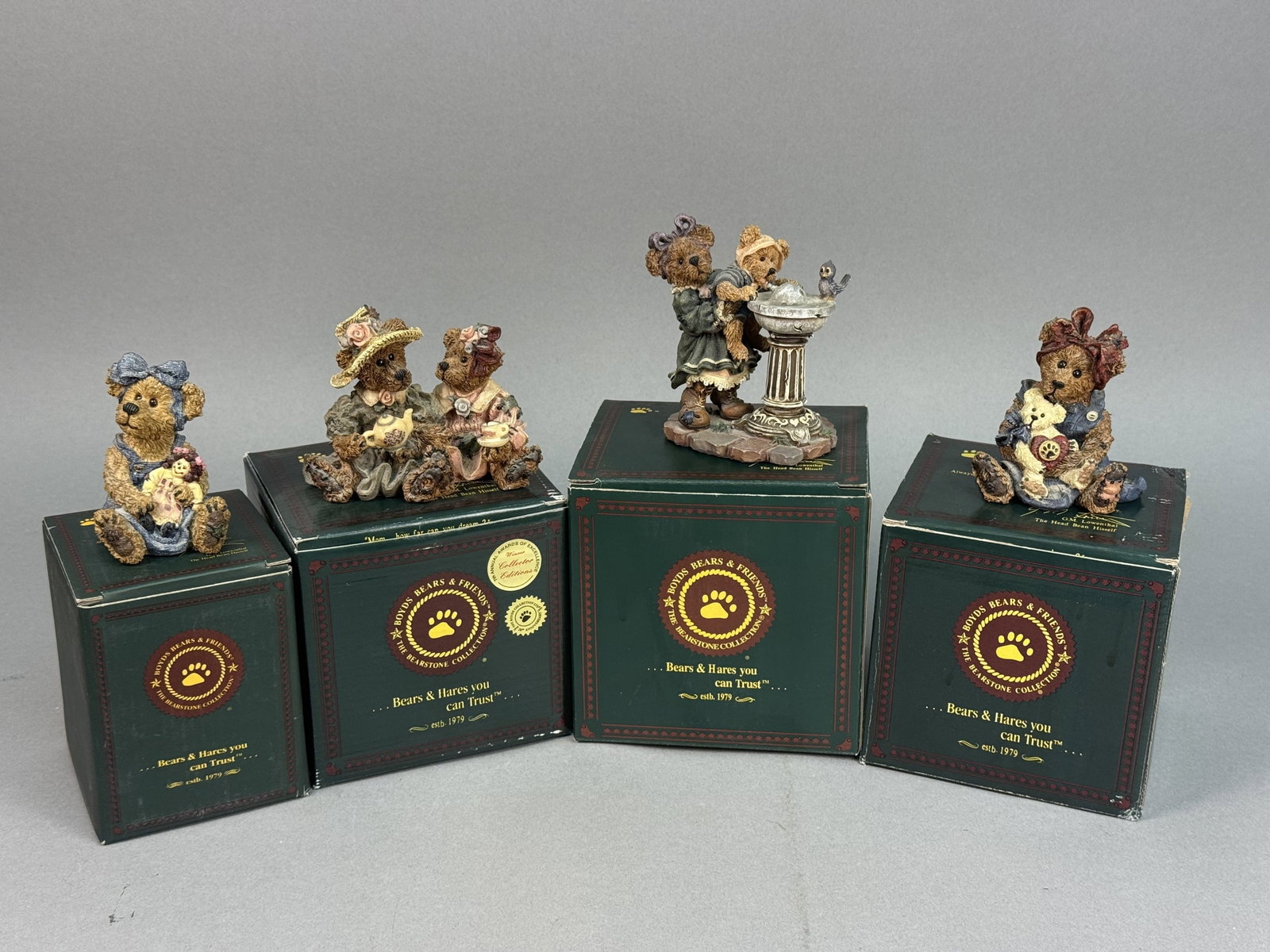 4 Boyds Bears Resin Bearstone Figurines: A set of four handmade in China cast resin figurines from the Boyds Bears & Friends Bearstone Collection. The set consists of Momma McBear and Caledonia... Quiet Time (Style 227711, dated 1998) featur