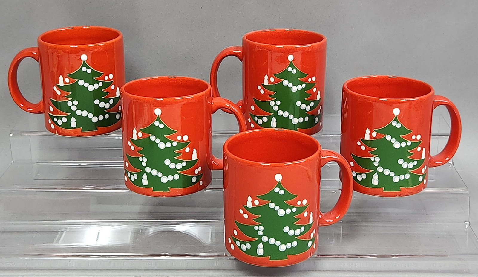 Waechtersbach Christmas Tree Mugs: A set of five earthenware mugs produced by Waechtersbach in a cylindrical form with simple curved handles. Height: 3.75 inches The set is in very good vintage condition. There are no visible chips,