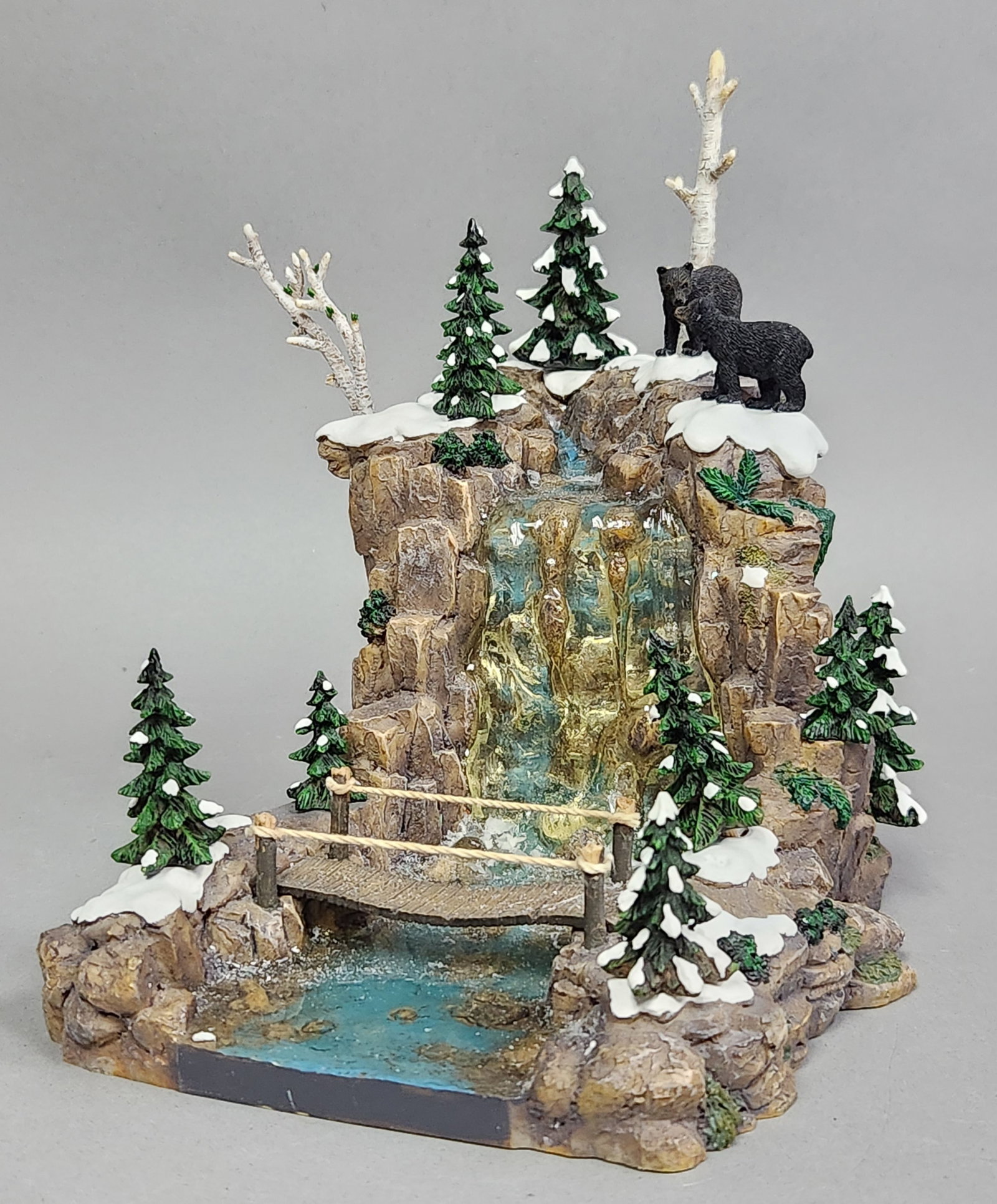 Dept 56 Resin Mountain Creek Waterfall: This Department 56 Village Accessories hand-painted resin figurine is titled Mountain Creek Waterfall, model number 56.53003. Height: 7.5 inches Width: 7 inches The figurine is in excellent overall