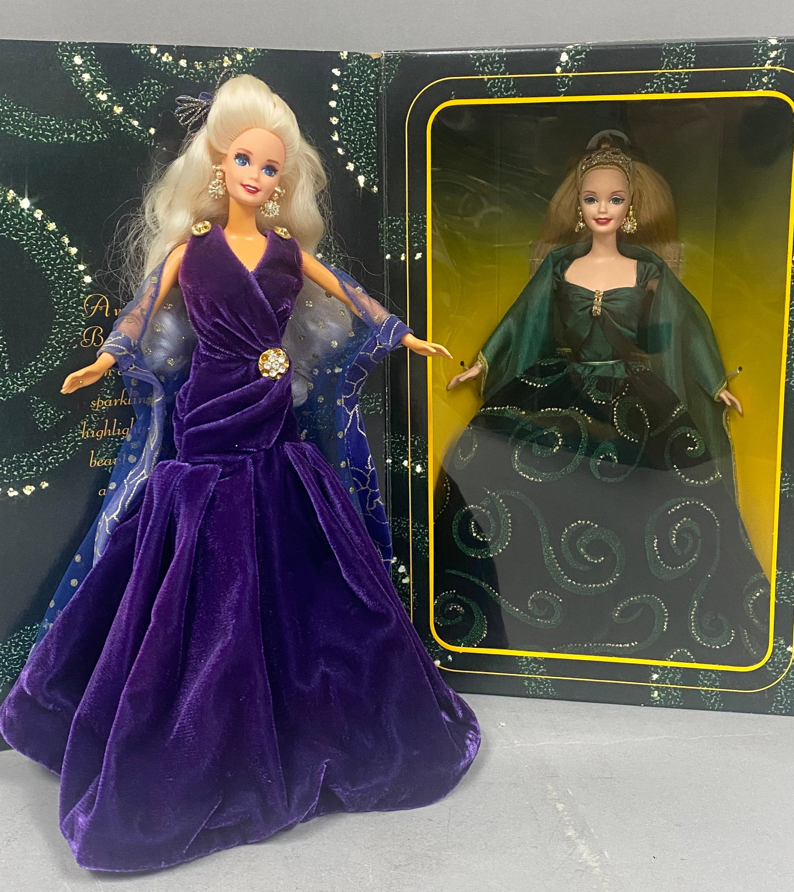 Mattel Society Style Collection Barbie Dolls: A set of two vinyl Barbie dolls manufactured by Mattel, both released as limited edition collectible figures for the adult market. The first doll is Sapphire Dream, which features rooted platinum blon
