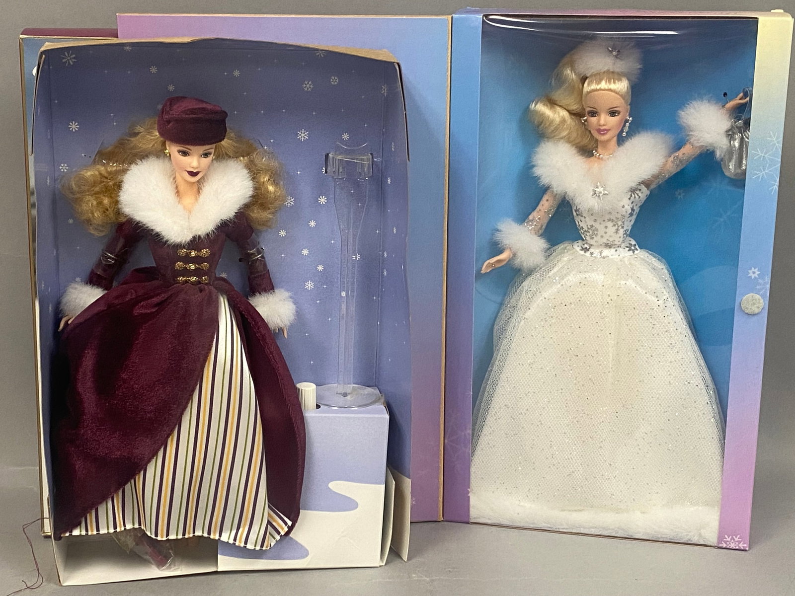 Mattel Victorian Ice Skater & Winter's Reflection Barbies: This lot features two collectible vinyl dolls manufactured by Mattel in their original factory packaging. The Victorian Ice Skater Barbie Doll, a Special Edition from 2000, features rooted blonde hair