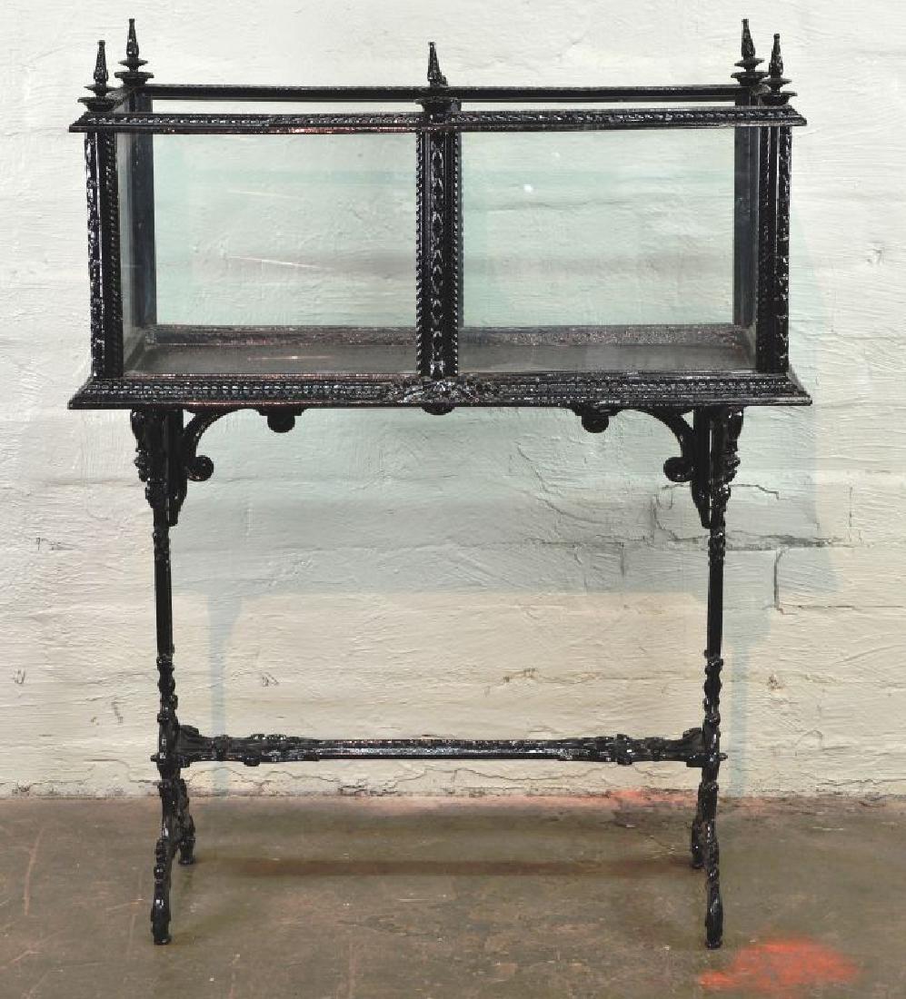 Wonderful Antique Victorian Black Cast Iron Plant Terra: Wonderful Antique Victorian Black Cast Iron Plant Terrarium with Stand. This lovely antique terrarium is not a fish tank and will not hold water, it is a terrarium for plants. The glass is newer and t
