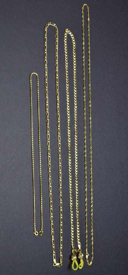Collection of four 14KT Yellow Gold Chain Necklaces App: This is a Collection of four 14KT Yellow Gold Chain Necklaces Approximately 19.9 Grams. The 14 KT gold marked chains measure approximately 23”, 22”, 26”, 15” and have a combined weight of 19.9