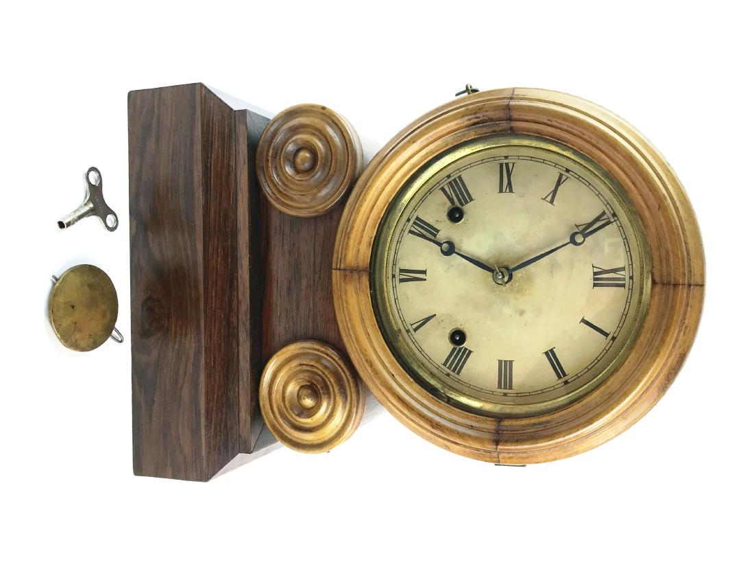 Ingraham 8 Day Clock: This is a beautiful Rosewood Case Ingraham 8 Day Clock made by E. Ingraham & Co. Bristol Connecticut. Calhoun Printing Works from Hartford, Connecticut printed the interior label with a date of March