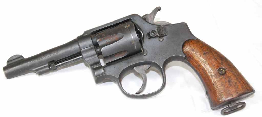 Vintage Smith & Wesson 38 Special CTG Double Action: This is a Vintage 38 Special CTG Smith & Wesson Double Action Revolver with Wood Grips. This gun has lots of wear, and surface rust, with a 4” inch barrel, and is a six shot. Great for home or perso