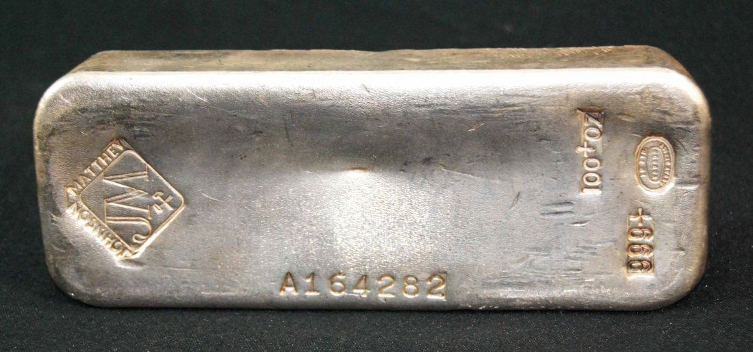 Johnson Matthey 100 Troy Ounce Bar of .999 Fine Silver: This is an Early Johnson Matthey 100 Troy Ounce Bar of .999 Fine Silver. These desirable loaf poured bars are getting harder to find. Please view the photos of this bullion bar. WOW!!!! Please Note: A