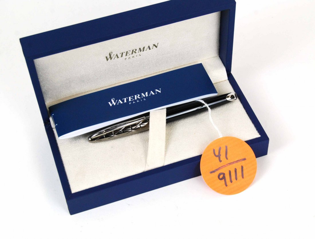 18K Gold Waterman, France, Fountain Pen: This is a Fancy Black Waterman Paris Fountain Pen Marked 18K. The pen appears to be new with the original box and paperwork. The cap is marked Waterman France and the ink tip is marked 18K 750. Please