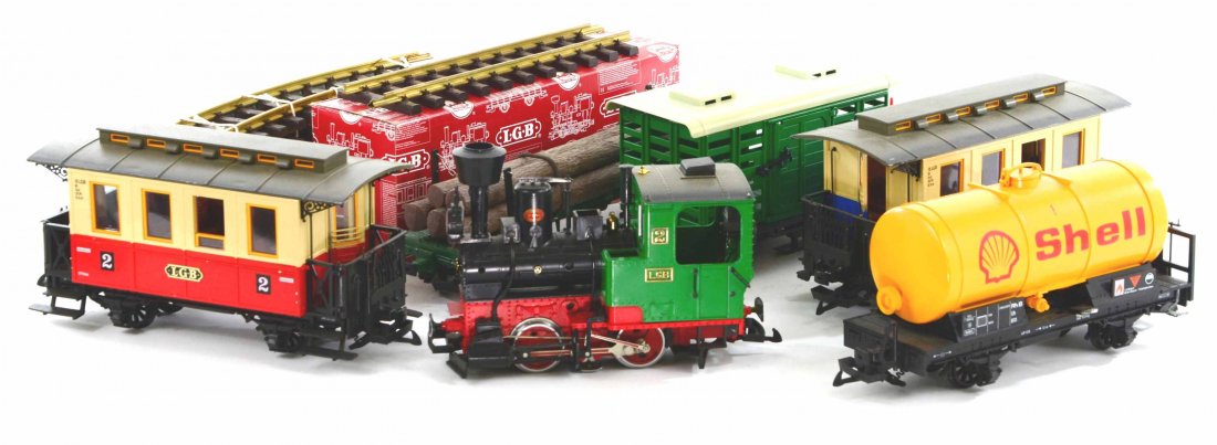 LGB Lehmann Toy Train Set, Engines, Track, Tankers: This is a Nice LGB West Germany Lehmann Toy Train Set. This set includes the 2020 Engine, 14 Pieces of track, Shell Tanker Car, 2 Passenger Cars, 5005 Animal Car, and the 4066 Log Carrier. This set is