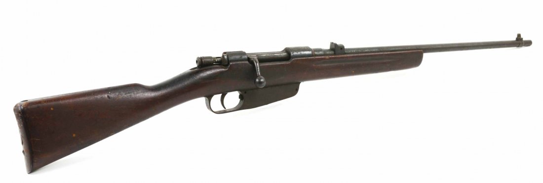1939 Italian Carcano Terni M38 7.35 Bolt Action Rifle: This is a Vintage 1939 Italian Carcano Terni M38 7.35 Bolt Action Rifle. This rifle has nice touch marks and a low serial # T1756 on the barrel and wood stock. The rifle has some surface rust, and nee