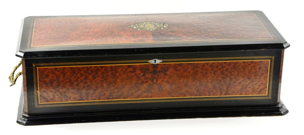 Swiss Cylinder Music Box with Wood, Brass and MOP Inlay: This is a Wonderfully Rare Antique Swiss Cylinder Music Box with Wood, Brass and Mother of Pearl Inlay. This piece is in wonderful Antique condition. The hand crank music box measures approximately 36