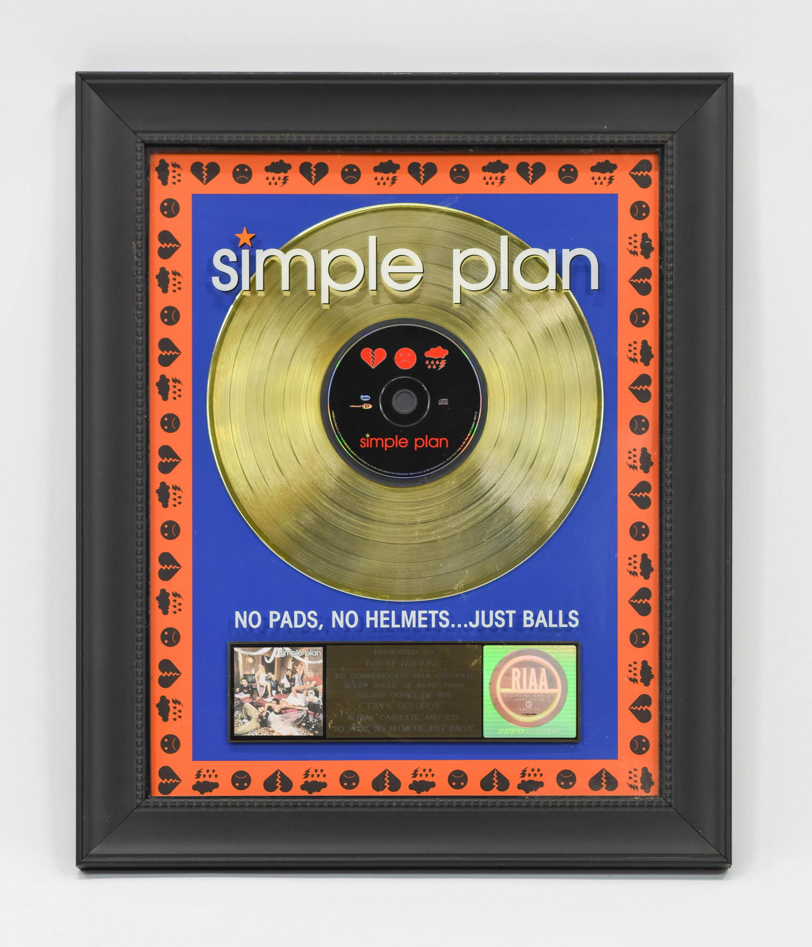 Framed Simple Plan RIAA Award, golden record, and CD: Recording Industry Association of America certified sales award, gold sales award of selling more than 500, 000 copies of â€œNo Helmets, Just Balls”