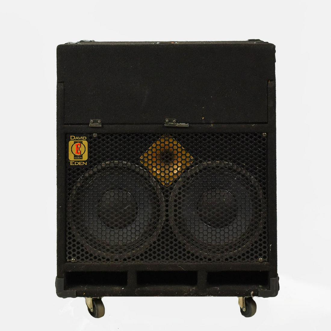 David Eden D-AH 250w Speaker Cabinet: Good cosmetic condition as shown, complete with front door. SN#: 19976. We did not test any of the amps, guitars or audio equipment. Listing and selling as is-as found.