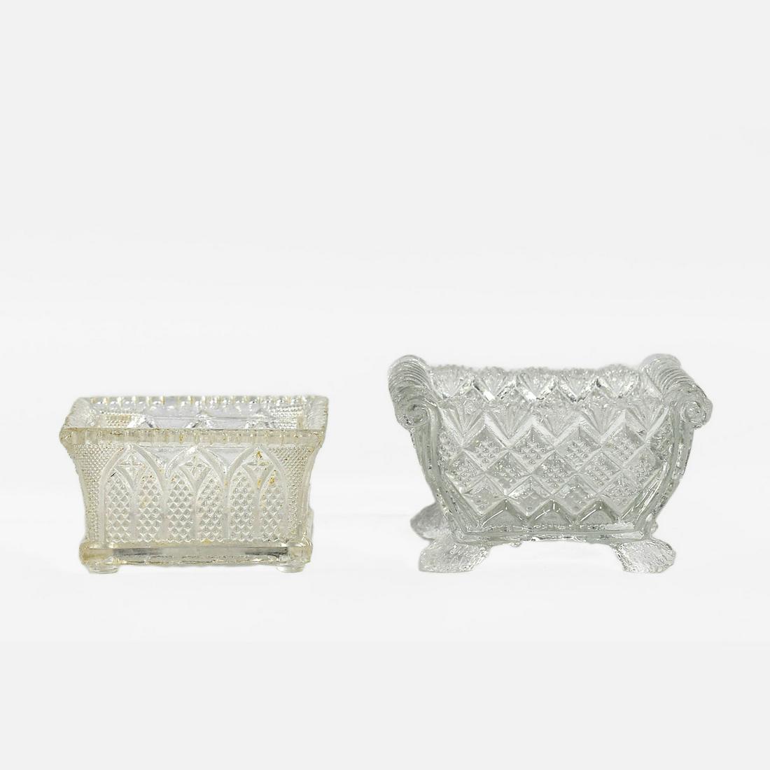 Two Boston & Sandwich Glass EAPG Salt Cellars: Ca. Mid 19thC. Both in excellent original condition with no chips cracks or repairs. H-2 W-3.5 D-2; no feet H-1.5 W-3 D-2;
