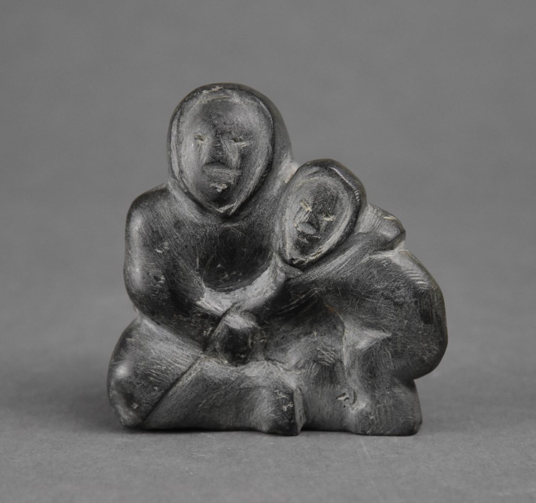 Native American Inuit Eskimo Carved Soapstone Mother and Child: Ca. last quarter 20thC. Very good original condition, signed on the base. From the estate collection we acquired the other Inuit pieces offered with this auction sale.