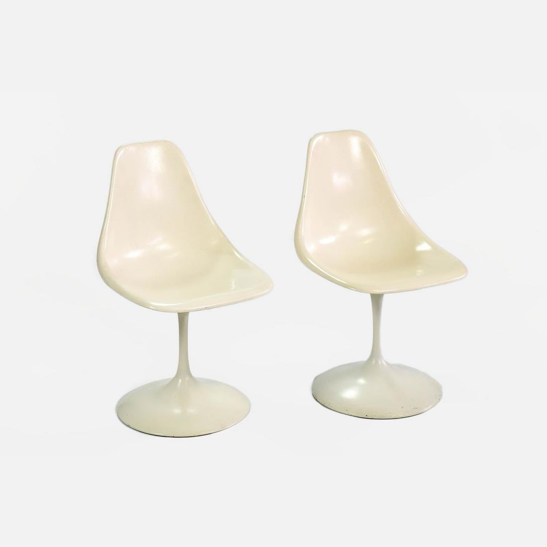 Two 1960s MCM White Tulip Swivel Side Chairs: Ca. mid 20thC. Age appropriate wear from use.