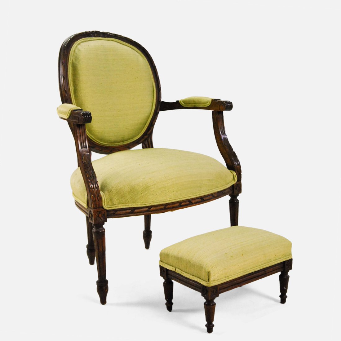 Late 19th Century French Louis XVI Style Armchair and Ottoman: Late 19th Century French Louis XVI style armchair and ottoman.