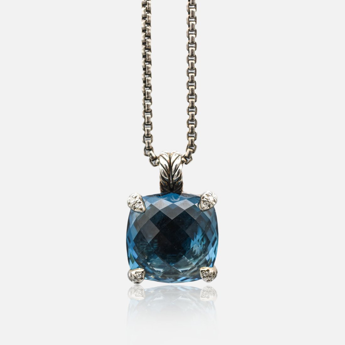 David Yurman London Blue Topaz Pave Diamond Pendant with DY Necklace: Excellent as shown, with combined weight approx. 12.8 Grams. The topaz measures approx 23mm x 23mm, the diamonds measure approx 1mm. Necklace measures 17 3/4" long. Pendant is marked "D.Y. 925 SJ", Ne