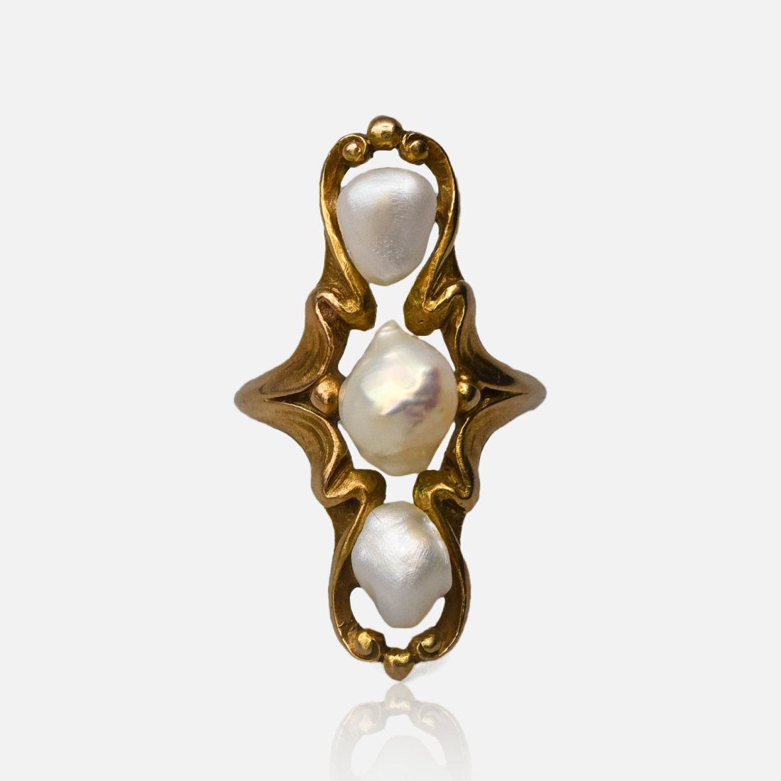 Fine 14K Yellow Gold Art Nouveau Baroque Pearl Ladies Ring: Ca. last half 20thC. Excellent with no chips, cracks or repairs. Weighs approx. 4.8 grams. Size 4. The three baroque pearls measure approx 8mm-6mm x 7mm x 6mm. The length of the ring measures 1.6".Gre