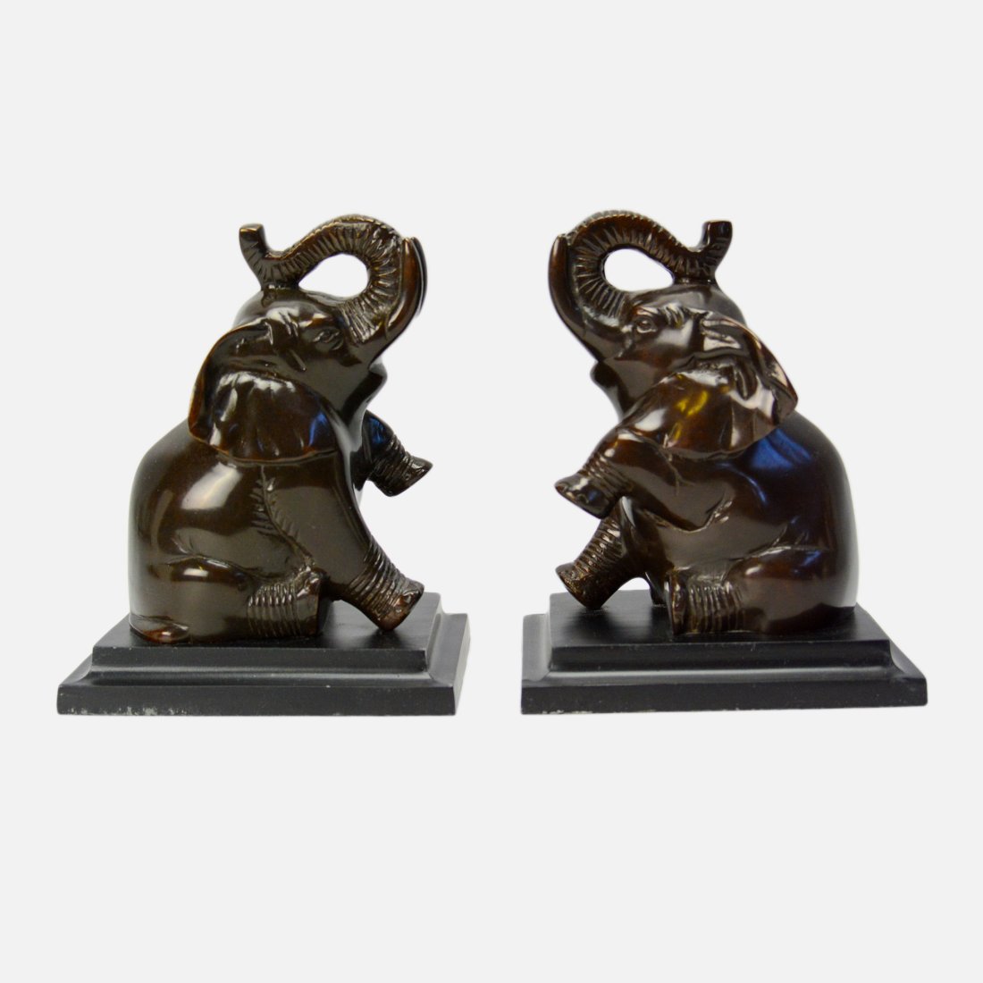 Pair Painted Metal Elephant Bookends: Ca. mid 20thC. Very minor paint chips on bases, otherwise no chips, cracks, or repairs. These are constructed similarly to Frankart.