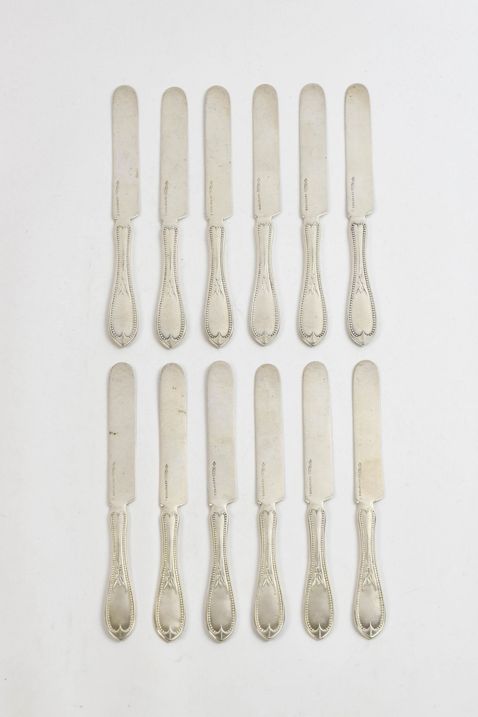 Set of 12 Heavy Theodore Evans Beaded Coin Silver Knives (1 of 2)
