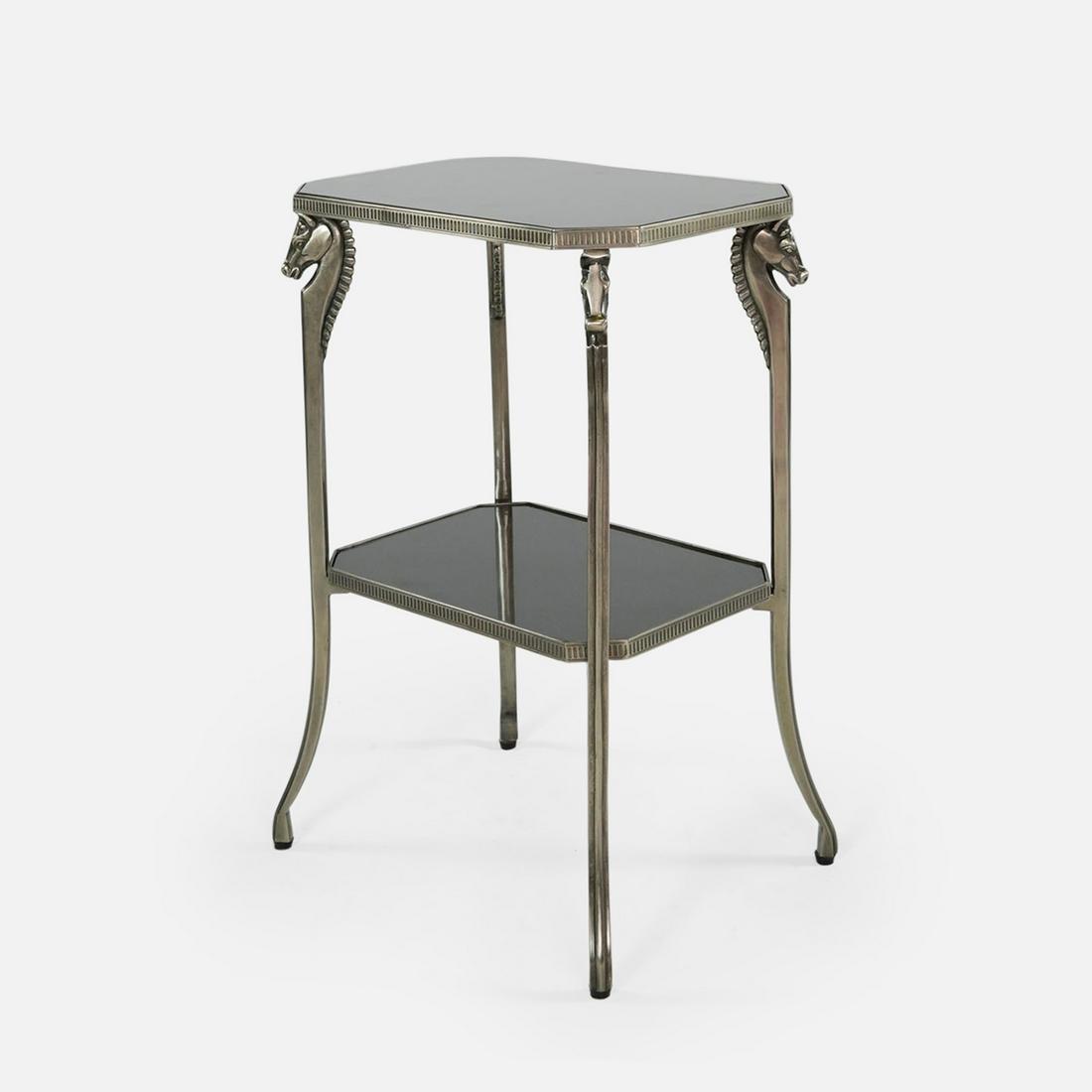 1930s Black Granite and Steel Art Deco Horse Head Side Table: Ca. first half 20thC. Excellent with no breaks, splits or repairs. Two-tiered table features ridged size and horse head corner supports. This form was once called a telephone table. The phone console