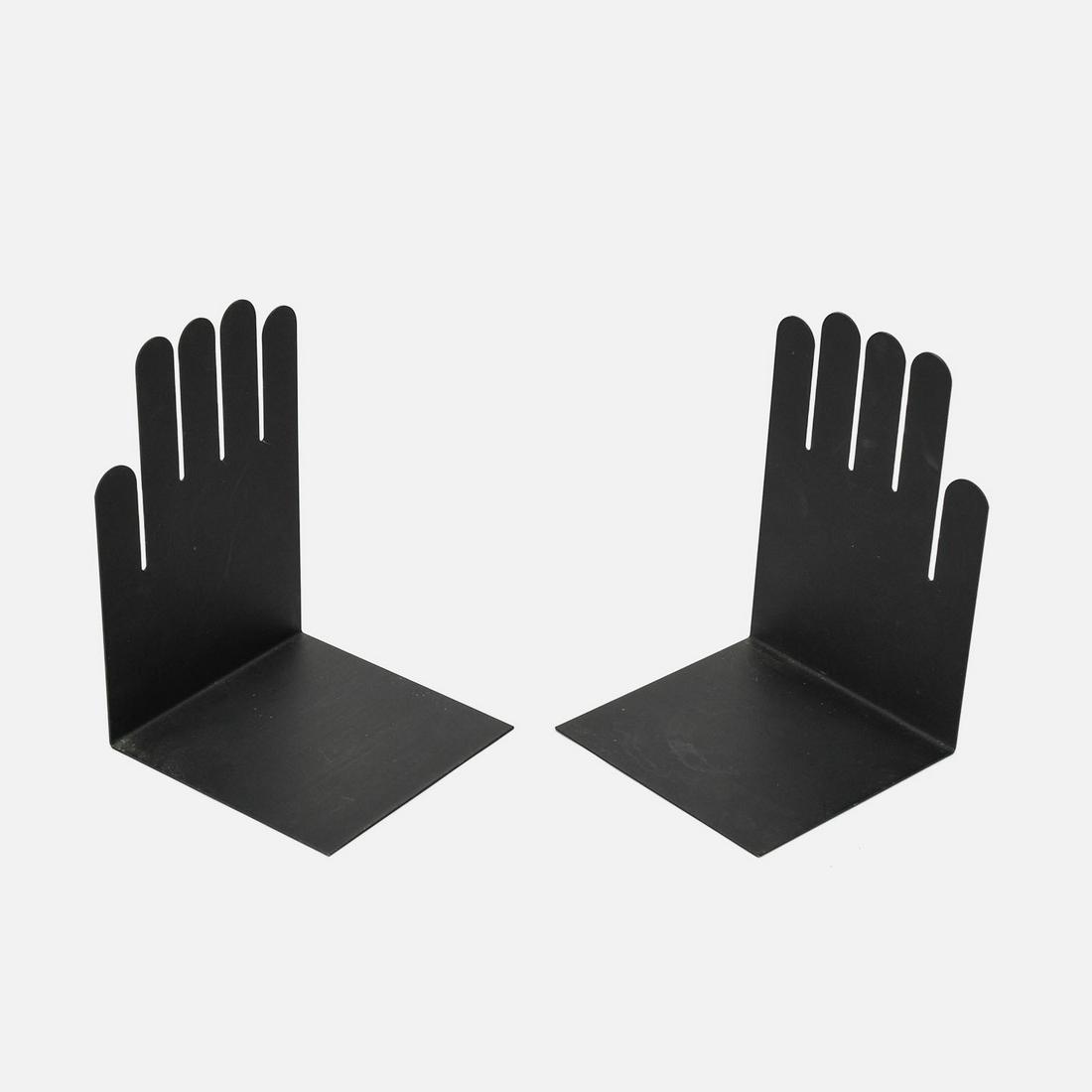 Pair of Hands Figural MCM Black Metal Bookends: Pair of fun black enamel metal bookends. Ca. last half 20thC. Very good condition with no bends or breaks.