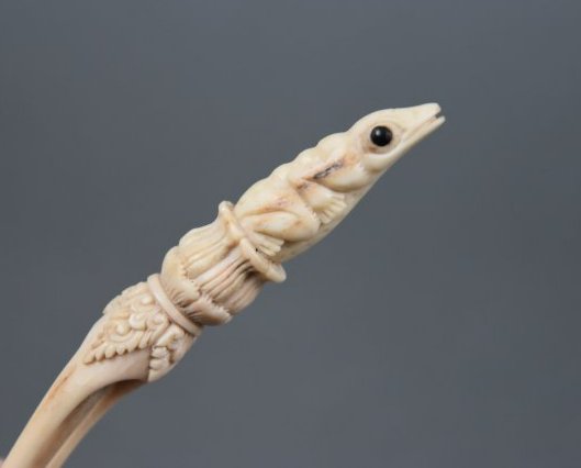 Antique Tribal Carved Bone Figural Frog Hair Stick Ornament: Ca. first half 20thC. Very good, with no chips, breaks or repairs. Not ivory, this is bone, not sure the animal. Approx. L: 5 5/8". The frogs eyes are made of black stone, and the middle pin is anothe