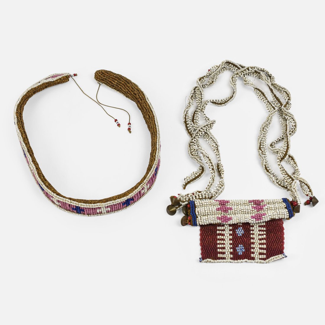 AFRICAN KWAZULU NECKLACE Natal Beaded Cache Sexe: Pre-1935. Otherwise known as an apron. This one made of glass beads, thick fiber thread, conical brass buttons, and fibre. The cache sexe portion approx. width: 5 1/2" x 3 1/4". The 1" wide belt neckl