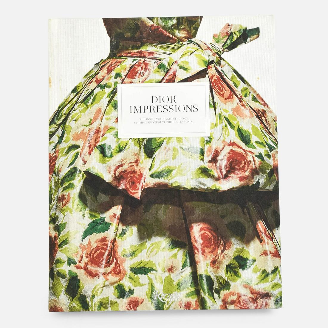 DIOR IMPRESSIONS 2013 The Inspiration and Influence of Impressionism at the House of Dior: Hardcover. A gorgeous exploration of the relationship between the haute couture of Dior and the Impressionist movement. Christian Dior grew up in Granville, in Normandy, in a natural environment simil