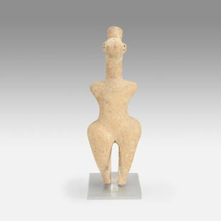 Ancient Amlash Terracotta Idol Fertility Goddess: Ca. 1500 BCE. Approx. H: 11 3/4". Appears to be intact with no cracks or restorations. Each ear features two holes. Custom acrylic museum stand included. Purchased in London, Rabiraffi Gallery, in 198