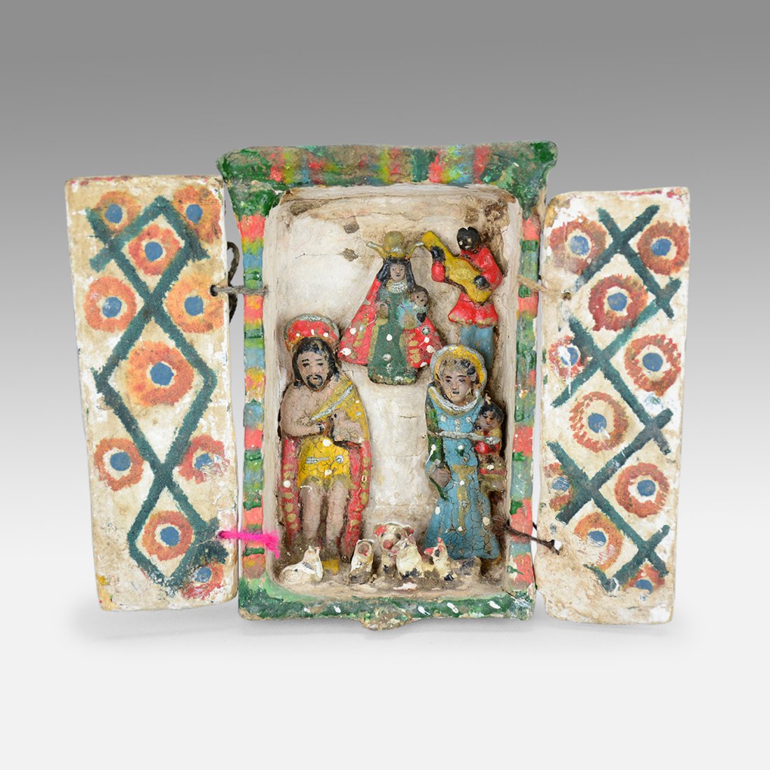 Vintage Early 20thC Peruvian Painted Wood Creche Retablo #1: Ca. early 20thC. Age appropriate surface wear along with minor wood losses. 5" wide when closed. 10" wide when open. Ex-Nooter coll.