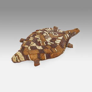 Native American Sioux Plains Indian Beaded Turtle Umbilical Fetish Toy: Ca. mid to late 19thC. Native American Sioux "Plains Indian" beaded turtle umbilical fetish. Traditionally in the form of a turtle (female) or lizard (male), two identical were produced, one to store