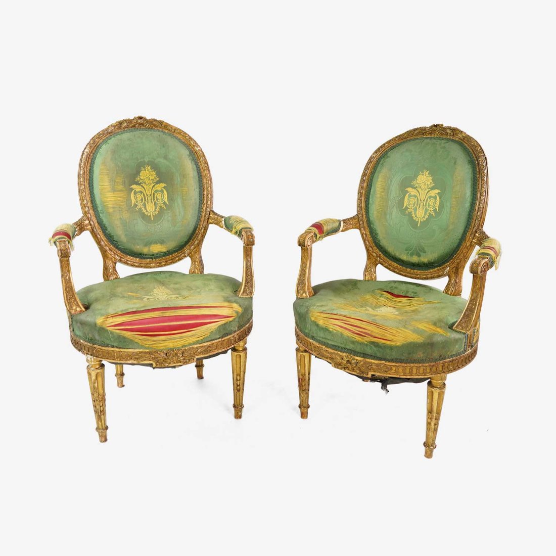 Antique Mid-19thC French Louis XVl Carved Giltwood Bergere Arm Chairs: Ca. second to third quarter 19thC. Carved giltwood shows surface abrasions and minor nicks, all age appropriate wear. Needs to be re-upholstered, as shown. Study and strong, these antique frames are s