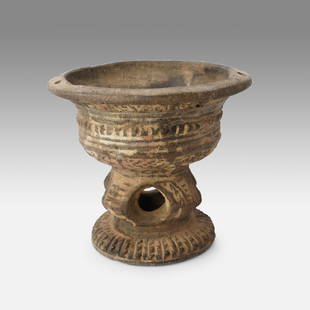 African Pottery Hanging Pedestal Base Oil Lamp Liberia: Ca. 1st half 20thC. Very good with no breaks or repairs. Notes located within the Nooter estate papers indicated a pedestal base oil font, pottery, with bent knees was purchased in Liberia. Ex-Nooter