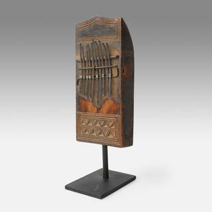 Chokwe Sansa African Tribal Thumb Piano Angola Kalimba: Ca. 20thC. Very good overall, with age-appropriate wear, right side shows much more wear than rest of sansa (see photo 7). With ten metal keys mounted onto a decoratively carved wood box.