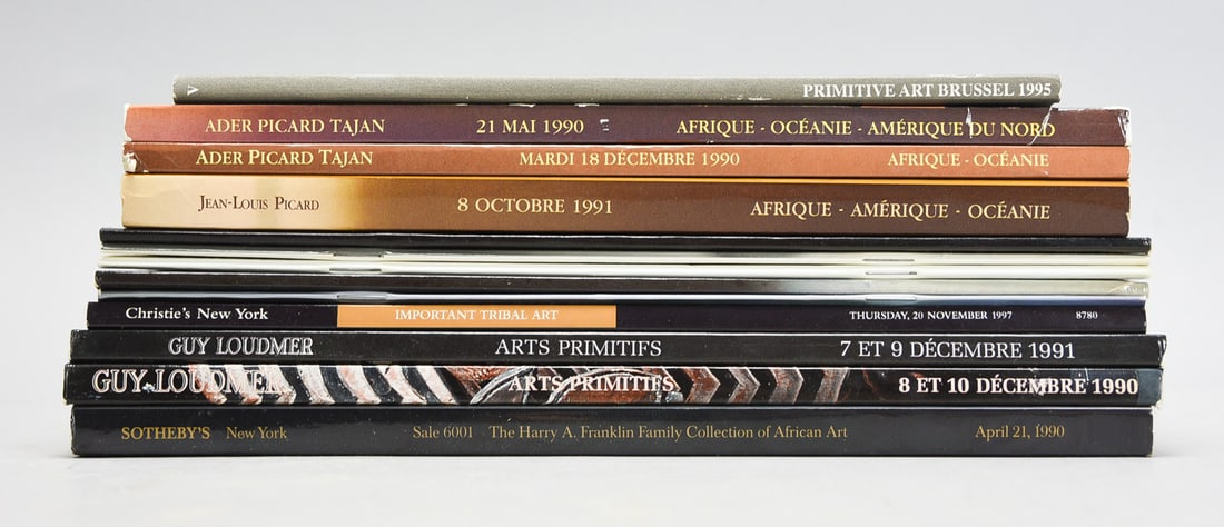 13 African Art Catalogs: Group of 13 African Art Catalogs. See picture of spine for titles. Possible annotations to the pages. Price result sheets may or may not be included. Each catalog measures approx. 10" H x 8" W.