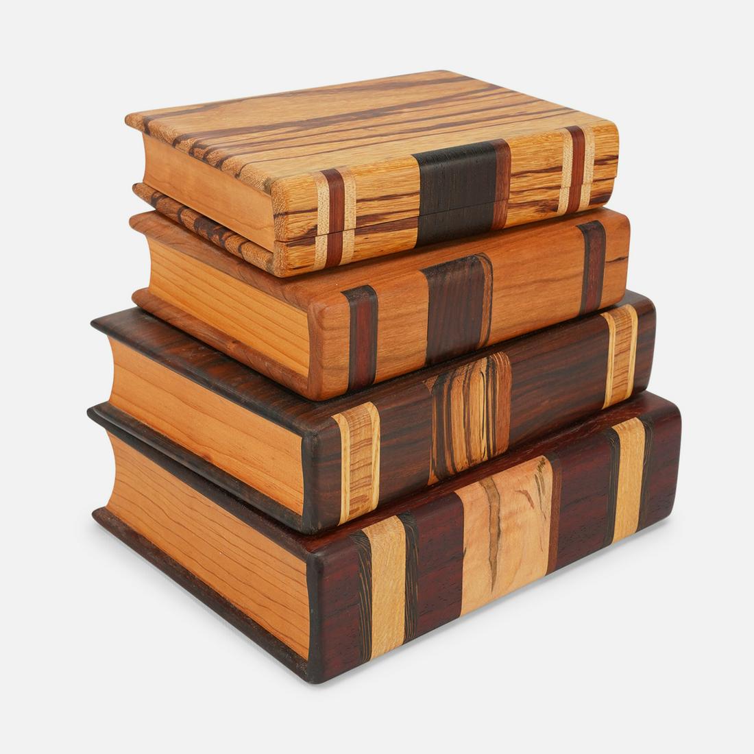 Levine, Steven Carved and Painted Wood Faux Book Pile Box Stack: Ca. late 20thC. Stack of books designed to be displayed horizontally; each book opens to a specious interior.