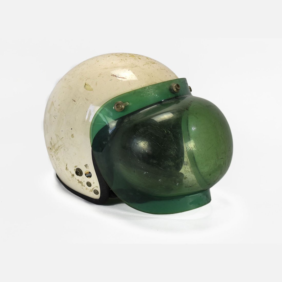 Vintage Arthur Fulmer AF40 Medium Racing Helmet: Ca. second half 20thC. A vintage Arthur Fulmer AF40 racing helmet with green visor in medium.
