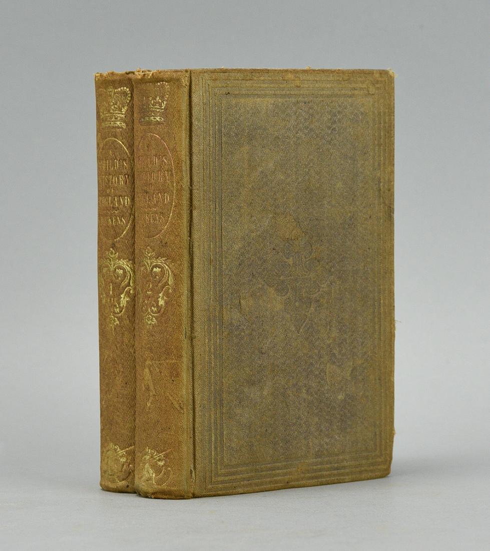 Dickens, Charles. A Childs History of England Boston 1854: Both good. Published by Jenks, Hickling, and Swan, Boston, 1854, Hardcover. Condition: Very Good. First American edition thus, by this publisher. Two volumes. 12mos. pp. 332; 355. Publisher's decorati
