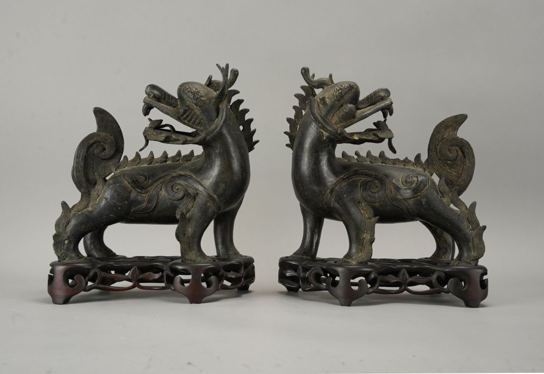 Impressive Antique 19thC Burmese Bronze Fu Dogs Statue Figurine PAIR on Fitted Base: Ca. 2nd to 3rd quarter 19thC. Age appropriate wear with some typical losses as described below. Intricate, with hand carved wood bases for both.