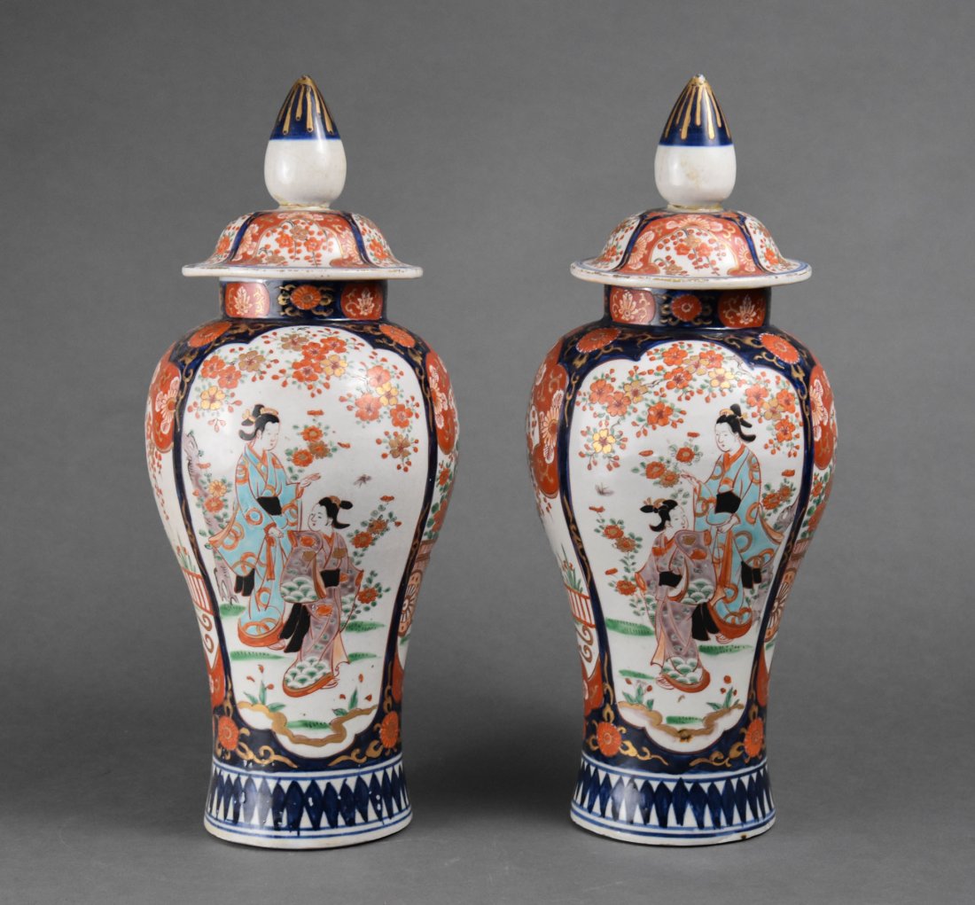 Large Antique Japanese Imari Porcelain Red and Blue Baluster Vase Pair w/Lids: Ca. first half 19thC. Fine porcelain. Both lids have the top finial repaired, otherwise fine with no other repairs, no chips or cracks.