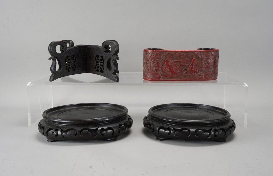 Three Good Chinese Carved Hardwood Circular Vase Stands PLUS Carved Cinnabar: Ca. 19th to 20thC. The carved cinnabar stand is an antique, likely 2nd to 3rd quarter 19thC, and it has a crack on the right rolled foot. The other three stands are wood, in good condition, and were m