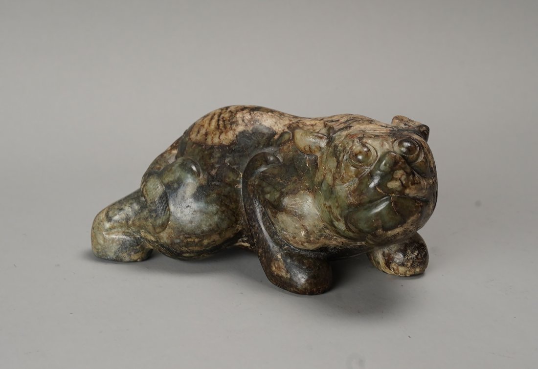 Antique Chinese Multi-Colored Jade Mythical Crouching Beast Figurine: Ca. 19thC. Very good with no chips, cracks or repairs. Heavy, with fine inset carved lines. Weighs a touch over 3 pounds. Purchased by the present owner from S. Bernstein & Co of San Francisco.
