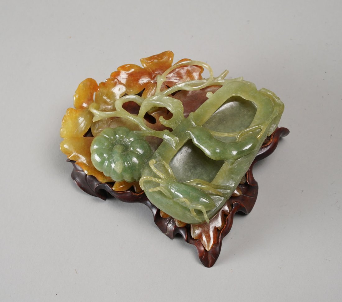 Fine Chinese Carved Multi-Colored Celadon Green Russet Jade Ornament w/Custom Stand: Ca. 20thC. Excellent with no chips, cracks or repairs. The wood stand is hand carved to fit the curves of the jade. Purchased by the present owner from S. Bernstein & Co of San Francisco. The jade wei